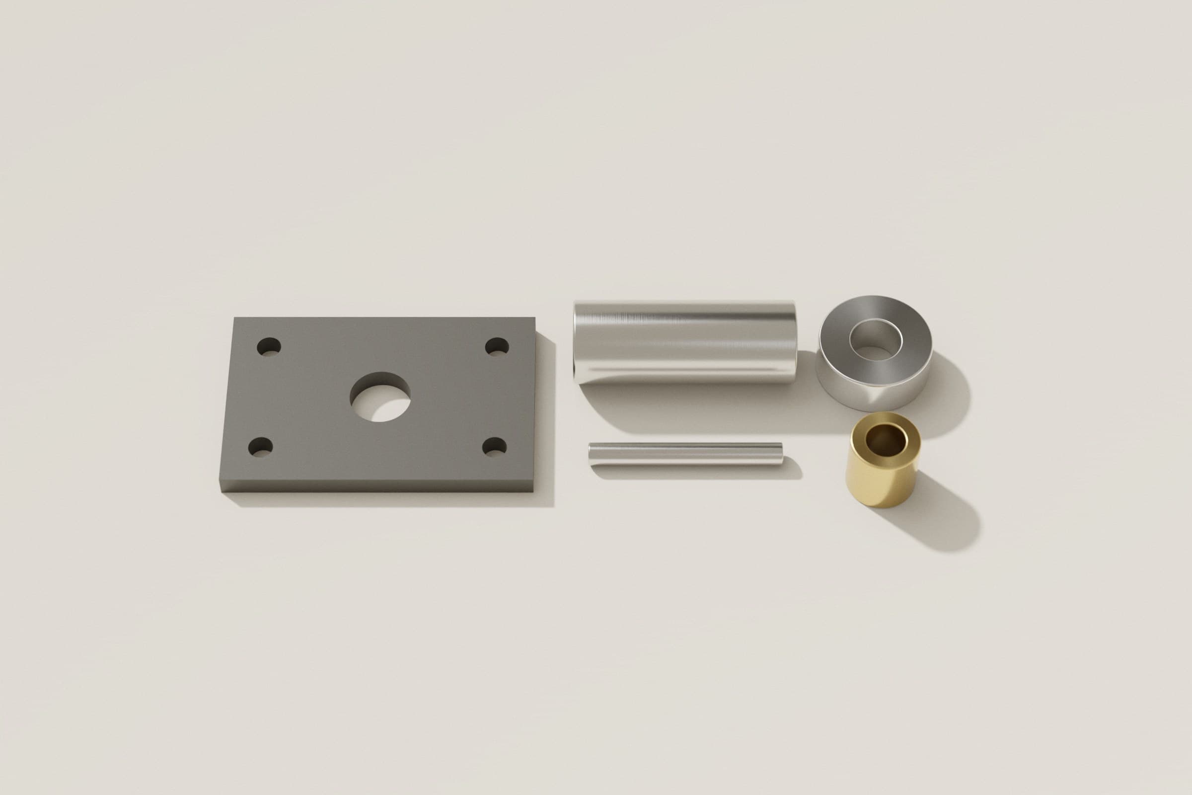 Gefertigte Einzelteile auf heller Fläche: Anthrazitplatte mit Bohrungen, Stahlzylinder, Stahlstift, Distanzring aus Aluminium und Messingbuchse